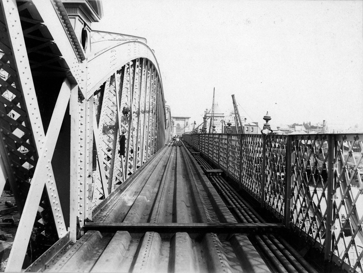 Troughs in place for the footpath on the second permanent Victoria Bridge, Brisbane, 1897, Brisbane City