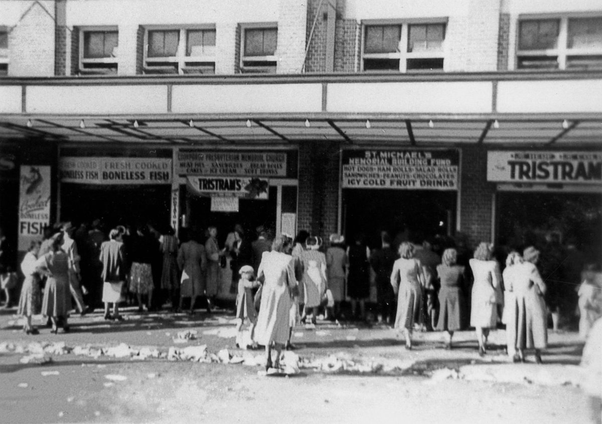 Queueing for a take-away meal and a Tristram's soft drink at the RNA Exhibition in 1949, Bowen Hills