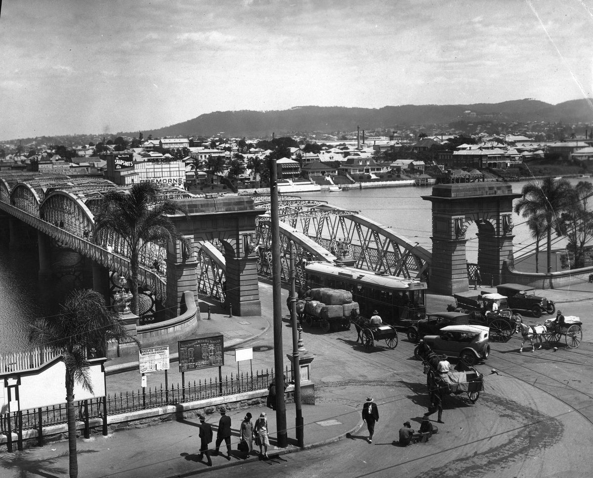 Cars, trams and horsedrawn carriages travelling on the second permanent Victoria Bridge, Brisbane, 1926, Brisbane City