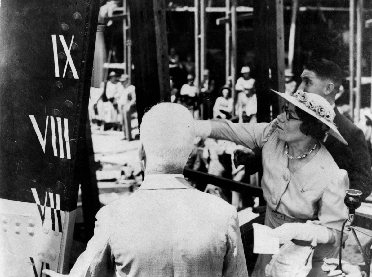 Mrs Michael Joseph McKewe, wife of the Director of Evans Deakin Shipyards in Brisbane, launching H.M.A.S. Broome, 1941