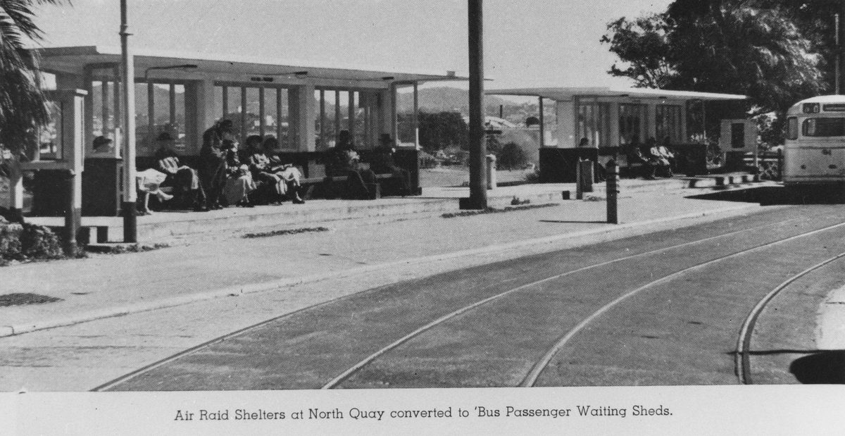 Air raid shelters at North Quay, Brisbane, converted to bus passenger waiting sheds, 1949