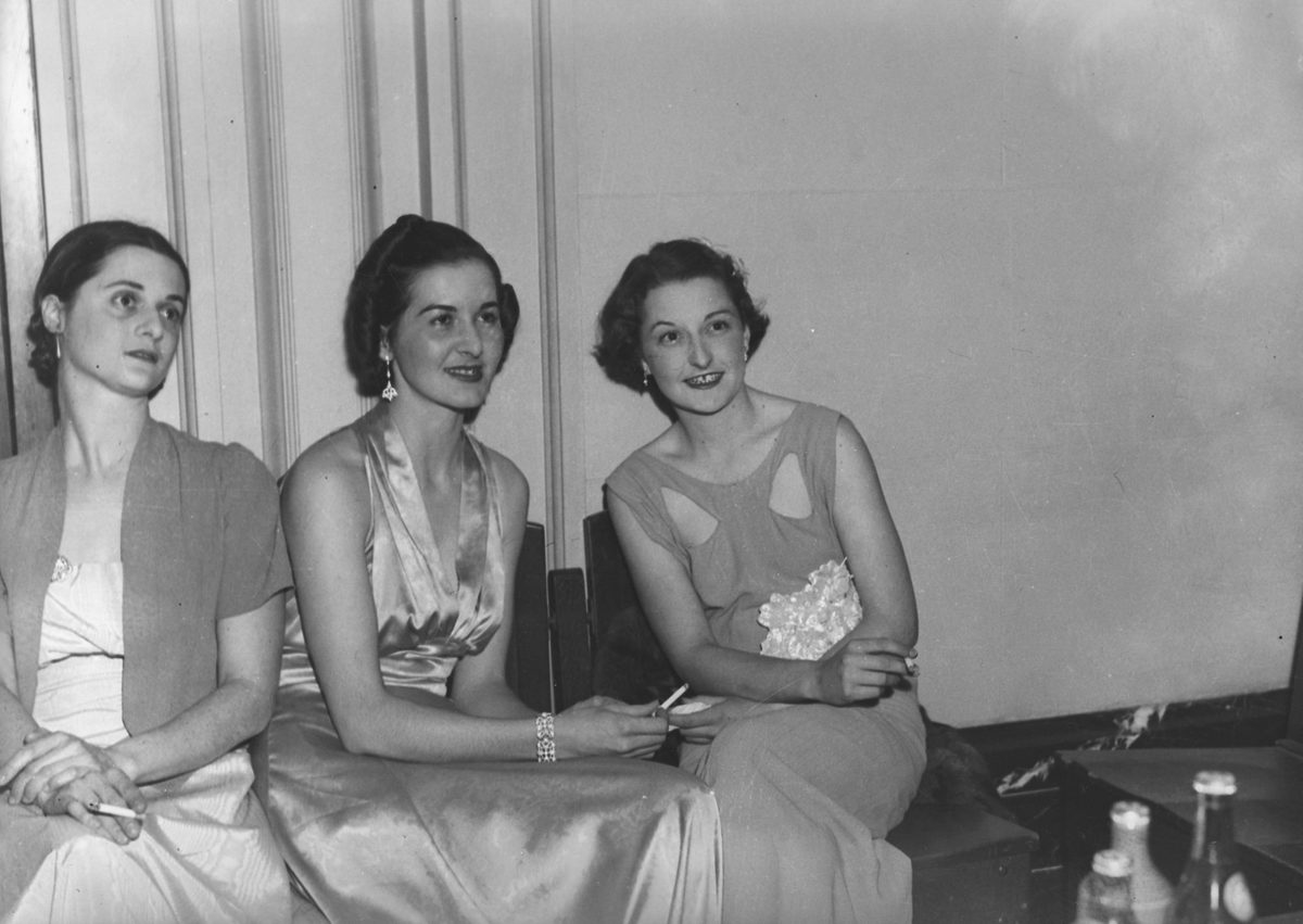 Three young women in evening dress, Brisbane, 1938