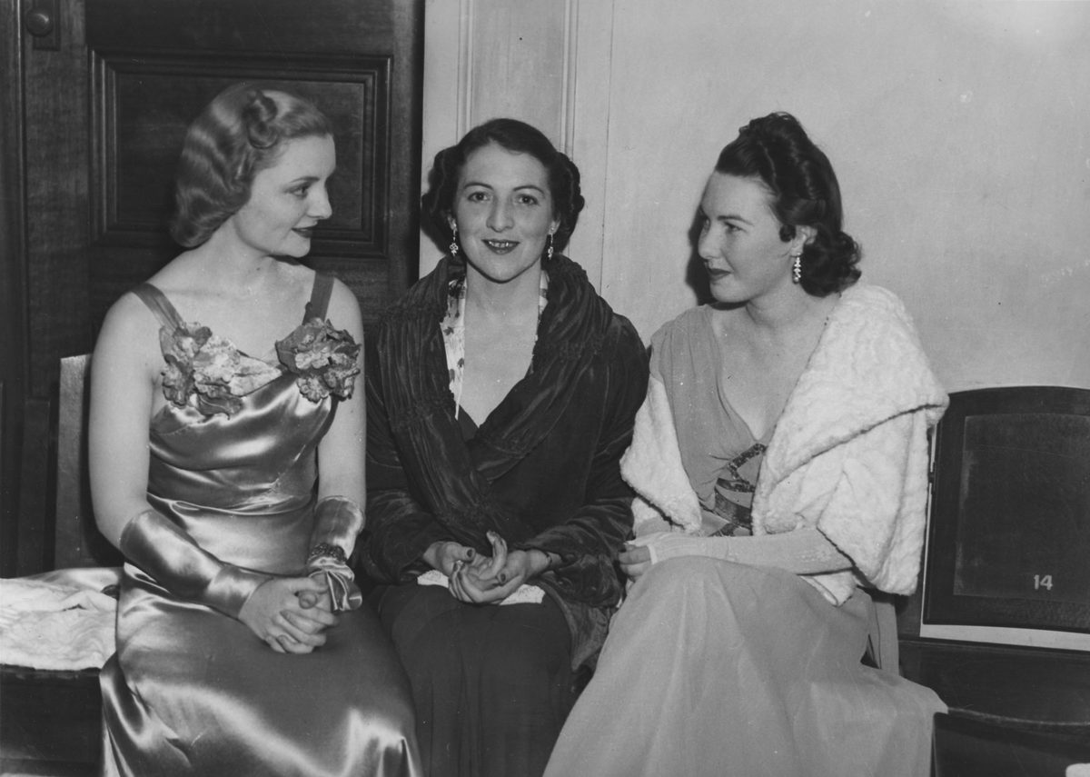 Three women in evening dress, Brisbane, 1939