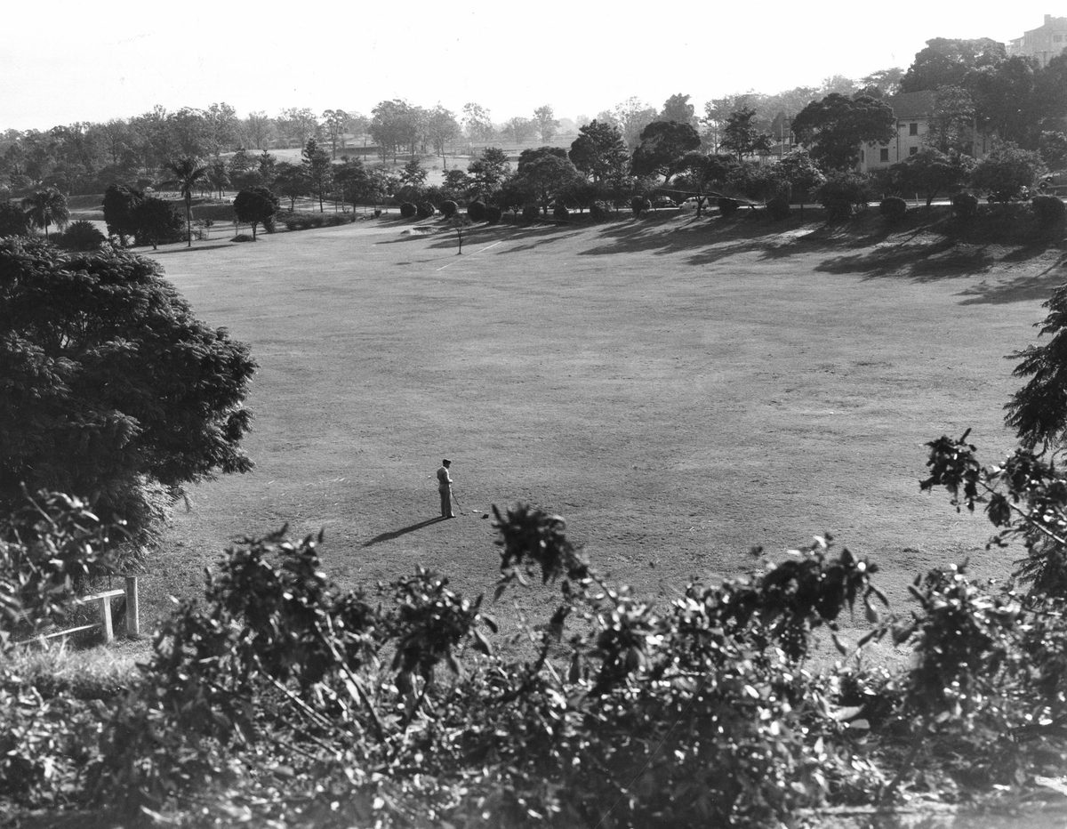 Lonely golfer at Victoria Park, Brisbane, 1954, Herston
