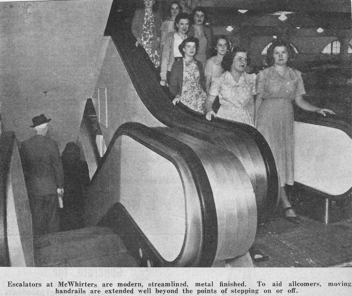 Customers using th escalators at McWhirters store, Brisbane, 1950, Fortitude Valley