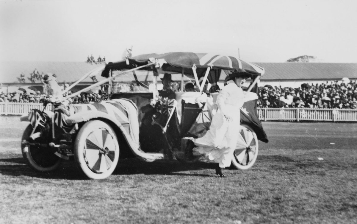 Woman exiting from a procession float in Brisbane, 1919