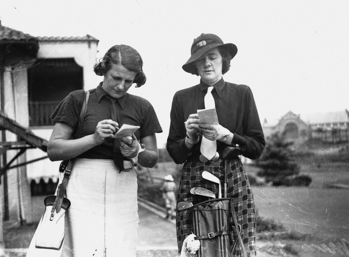 Women golfers add up their score cards, 1938, Brisbane