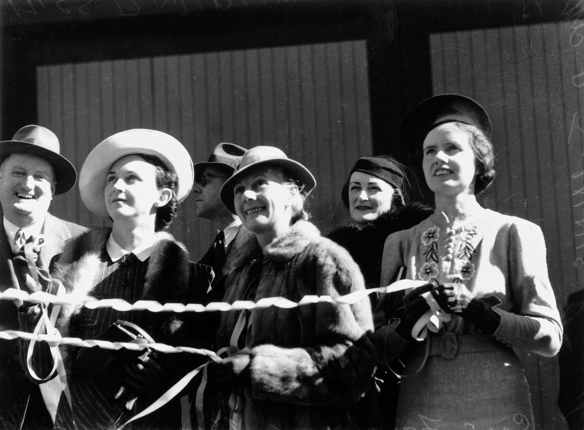 Miss Barbara Midson and Mrs P. J. Innis farewell the Gow family on board the Kanimbla, 1939, Brisbane