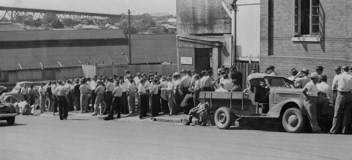 Wharf labourers waiting to apply for jobs, November 1949, Brisbane City