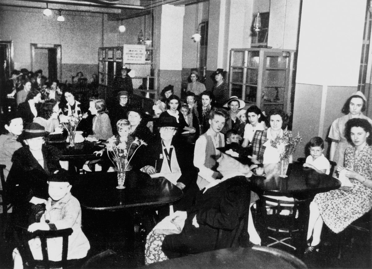 Women and children enjoying a break in the Women's Rest Room, City Hall Brisbane, 1942, Brisbane City