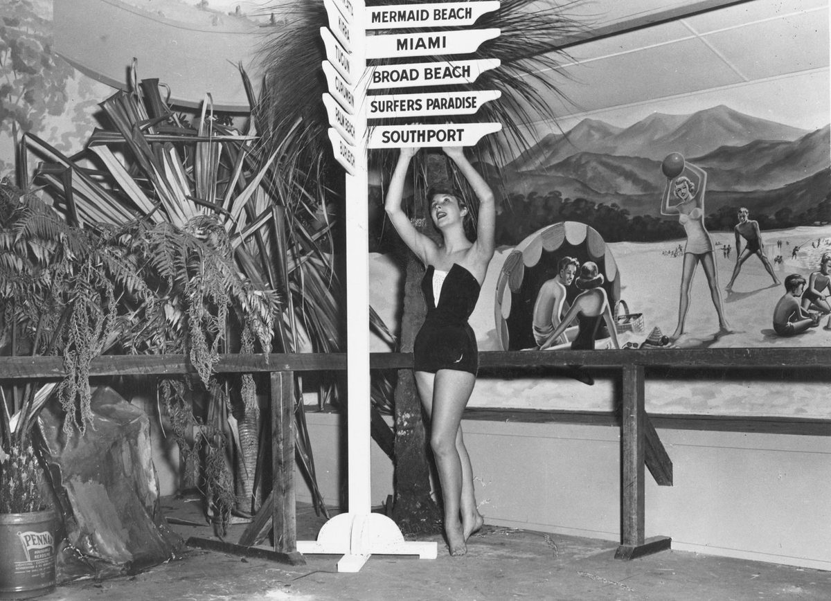 Young lady posing as part of a tourist exhibition, 1954, Brisbane