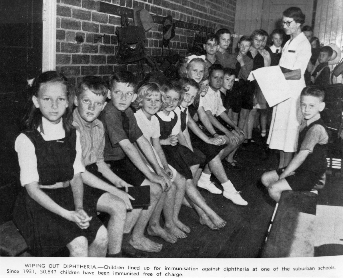 Brisbane schoolchildren waiting to be immunised against diphtheria, 1943